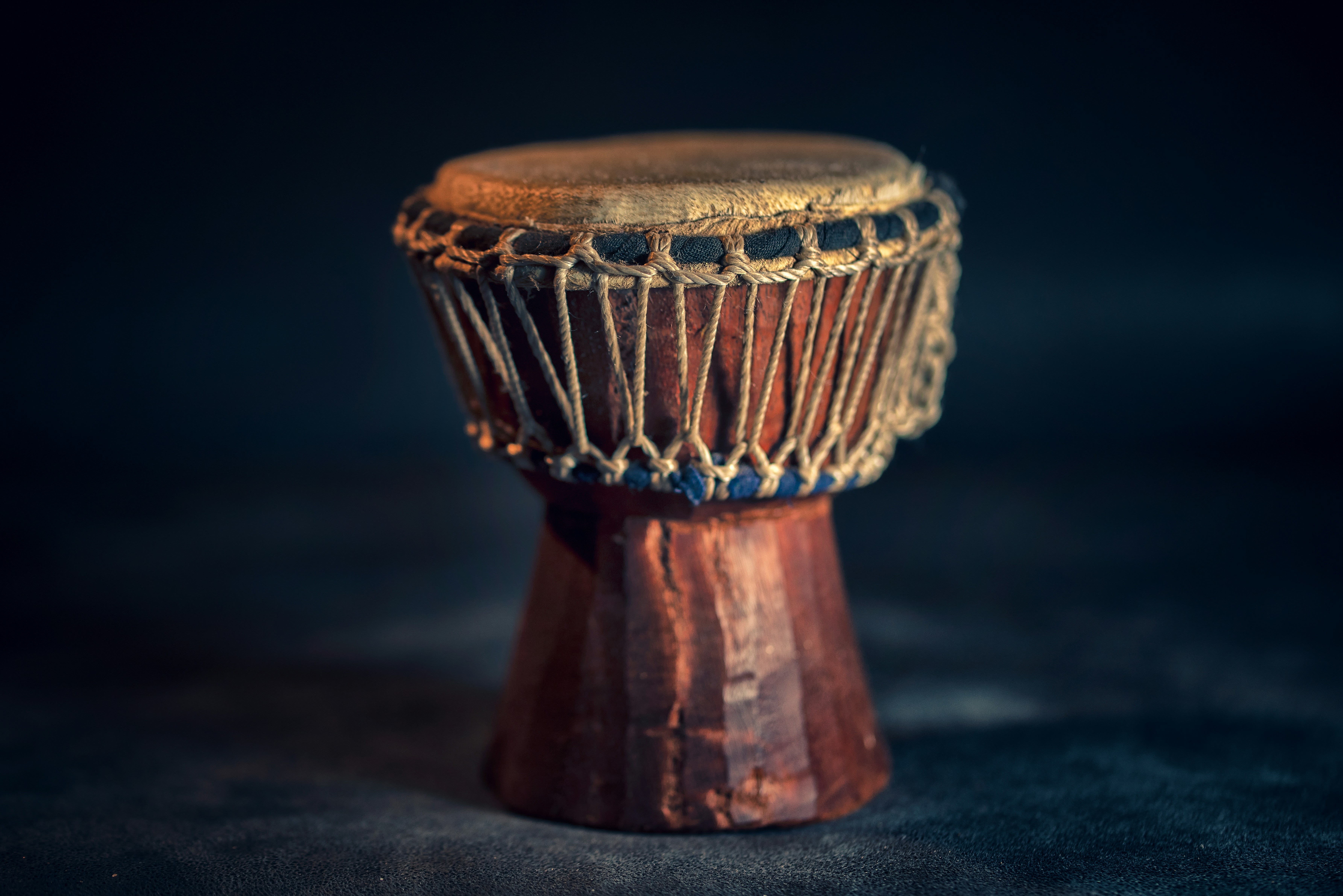 A very small and simple drum with a circular head.