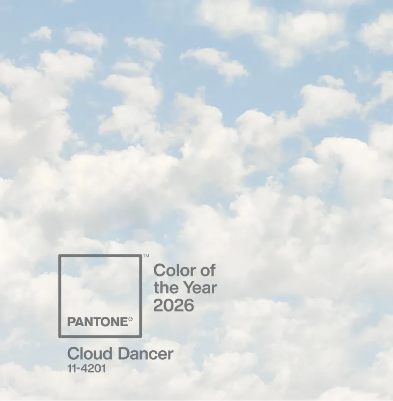 A serene cloudscape with the words 'Pantone color of the year: cloud dancer.
