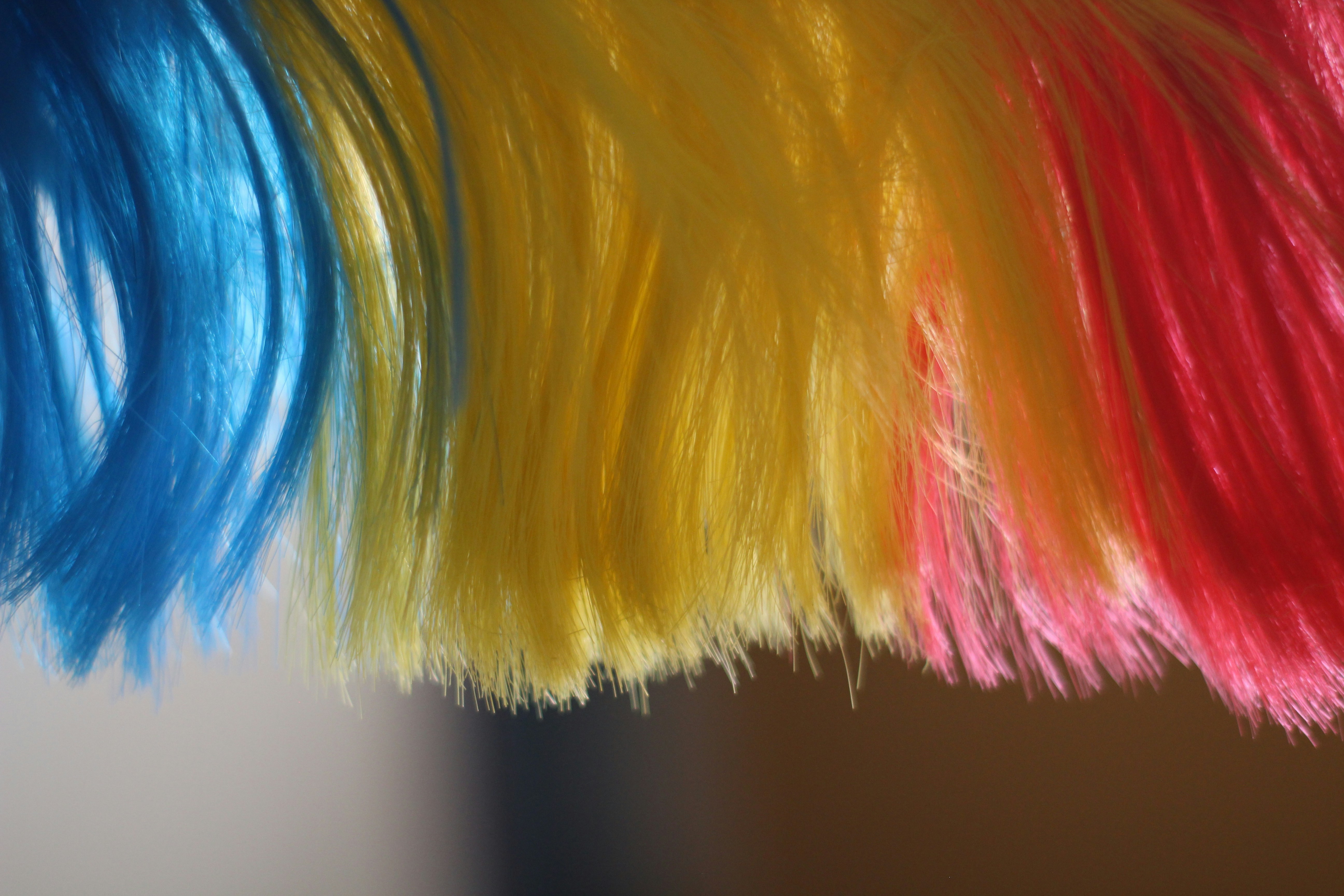 Dyed hair ends of various colors.